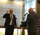 Thumbnail of the new Commerce City Judge Brian Bowen being sworn in by the mayor