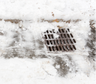 A storm drain during the winter